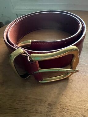 Fossil leather belt with chunky brass hardware
